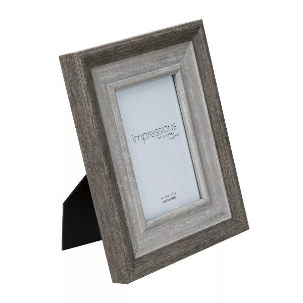 Wooden picture frame with 'impressions' logo on a white background