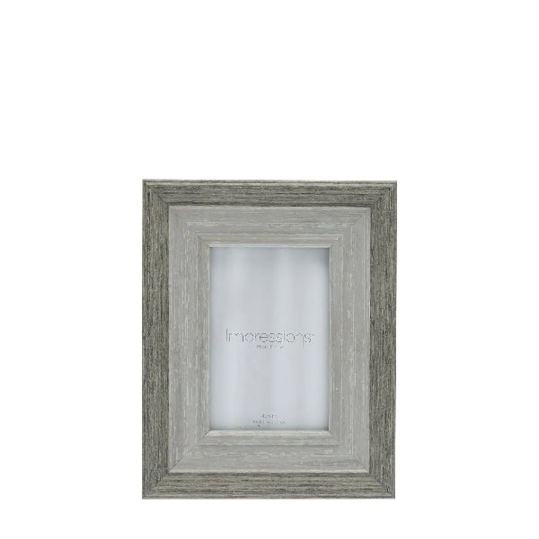 Wooden picture frame with 'Impressions' branding on a white background