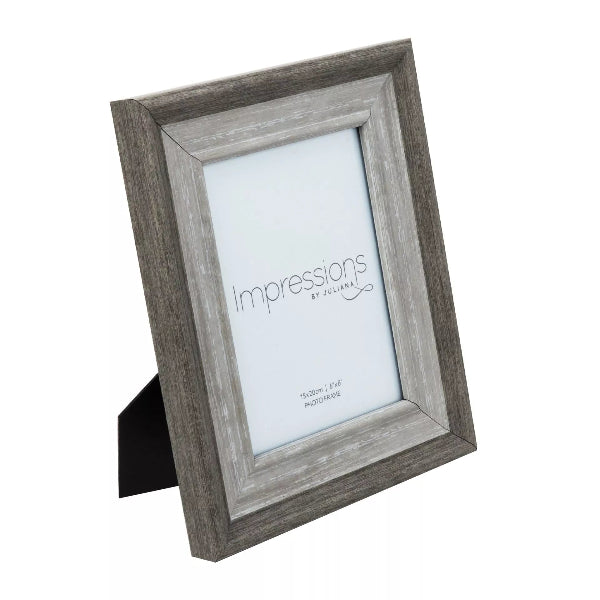 Wooden picture frame with 'Impressions' branding on a white background