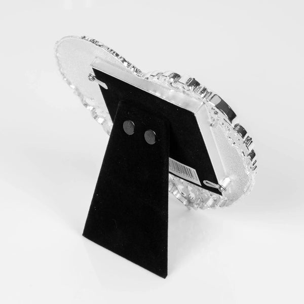 Clear crystal earring display stand on a white background