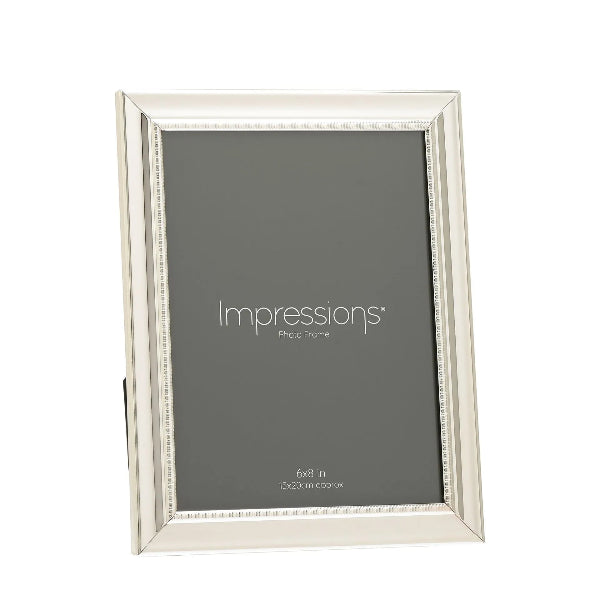 Silver photo frame with 'Impressions' branding on a white background