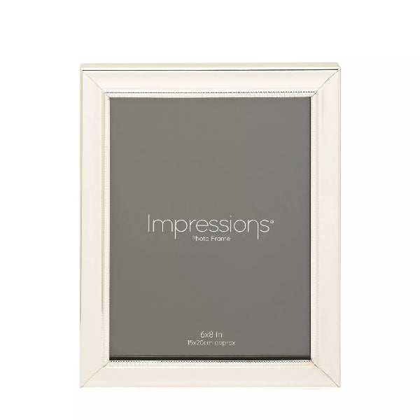 White photo frame with 'Impressions' branding on a white background