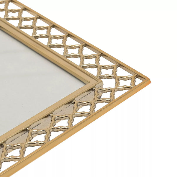 Gold decorative mirror frame on a white background