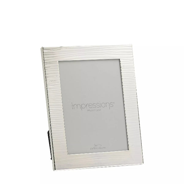 Silver photo frame with 'Impressions' branding on a white background