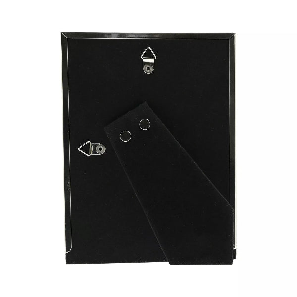 Black rectangular object with a textured surface on a white background