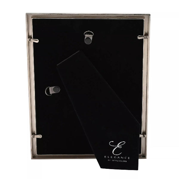 Black photo album with silver metal corners on a white background