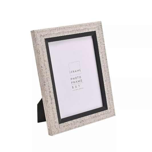 A 5x7 inch standing picture frame with a textured light gray wood-grain finish and a black inner border, shown on a plain white background.