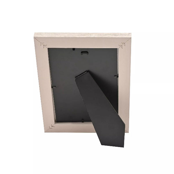Beige pet door with a black flap on a white background