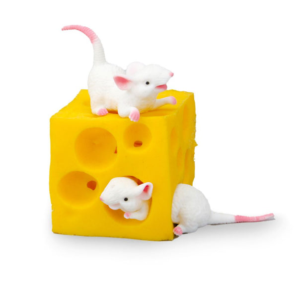 Three toy mice on a yellow cheese block with a white background