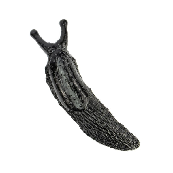 Black slug-like creature on a white background