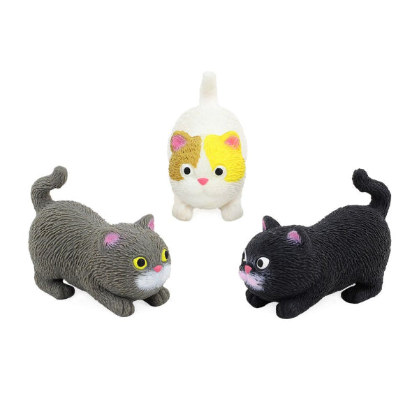 Three cat-shaped toys in gray, black, and multicolor on a white background