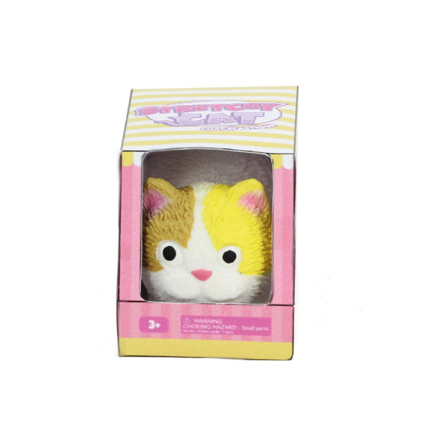 Plush toy cat in a pink and yellow box on a white background