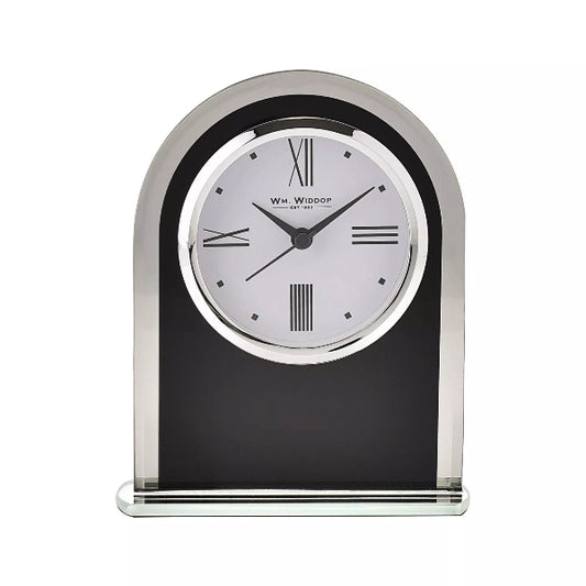 Table clock with black face and silver rim on a white background