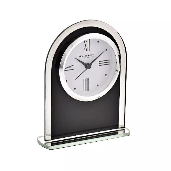 Decorative clock with black base and silver rim on a white background