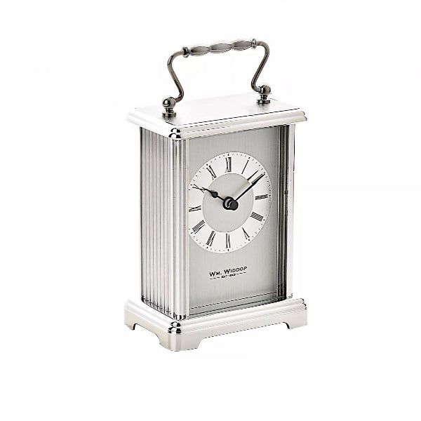 Silver carriage clock with a white face on a white background